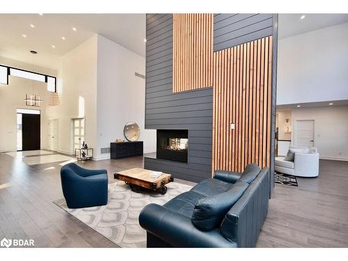 57 Glenhuron Drive, Springwater, ON - Indoor With Fireplace