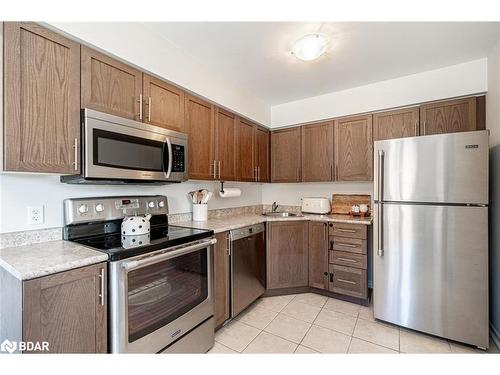 7-25 Madelaine Drive, Barrie, ON - Indoor Photo Showing Kitchen With Stainless Steel Kitchen