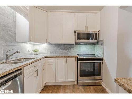 2185 Ferguson Street, Innisfil, ON - Indoor Photo Showing Kitchen With Stainless Steel Kitchen With Double Sink With Upgraded Kitchen