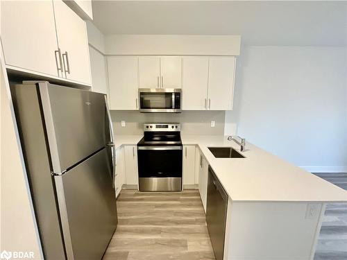 303-1100 Lackner Place, Kitchener, ON - Indoor Photo Showing Kitchen With Stainless Steel Kitchen