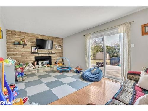 279 Sunnidale Road, Wasaga Beach, ON - Indoor Photo Showing Living Room With Fireplace