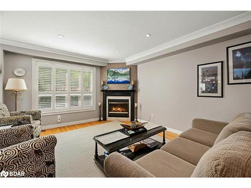 22-130 Robert Street, Milton, ON - Indoor Photo Showing Living Room With Fireplace