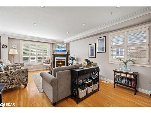 22-130 Robert Street, Milton, ON - Indoor Photo Showing Living Room With Fireplace