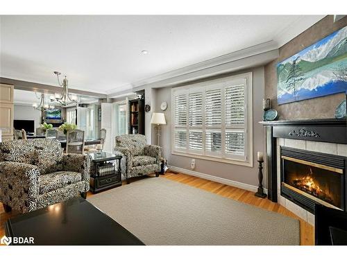 22-130 Robert Street, Milton, ON - Indoor Photo Showing Living Room With Fireplace