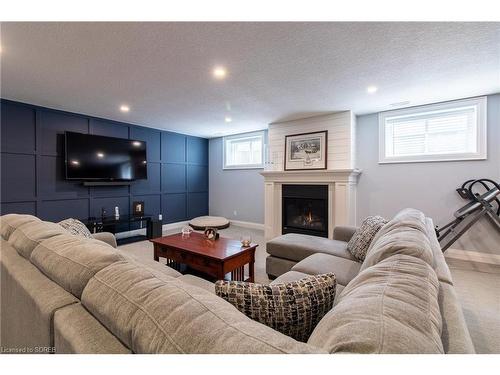 56 Beechnut Lane, Port Dover, ON - Indoor Photo Showing Living Room With Fireplace
