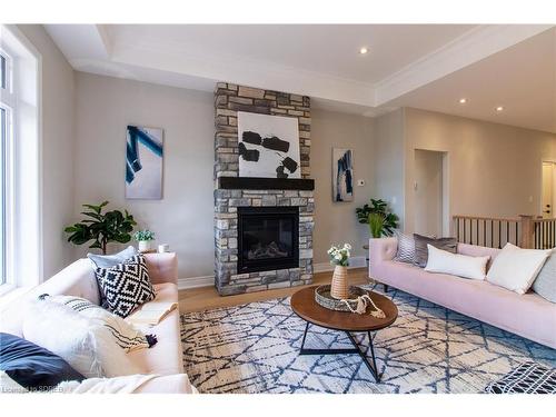 82 Duchess Drive, Delhi, ON - Indoor Photo Showing Living Room With Fireplace