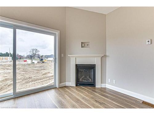 393 Argyle Avenue, Delhi, ON - Indoor Photo Showing Living Room With Fireplace