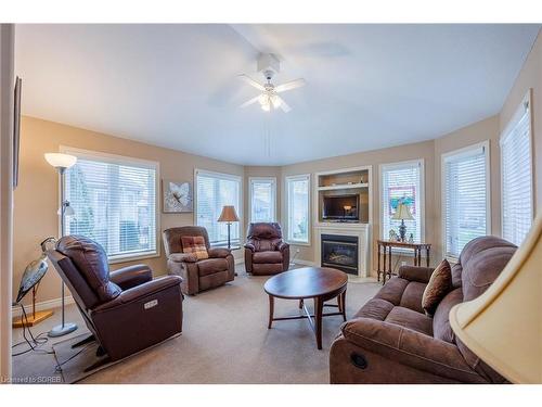 32 Upper Canada Drive, Port Rowan, ON - Indoor Photo Showing Living Room With Fireplace