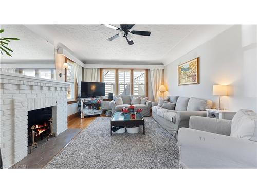 22 Church Street E, Delhi, ON - Indoor Photo Showing Living Room With Fireplace