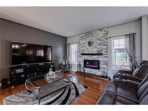 26 Blossom Avenue, Simcoe, ON - Indoor Photo Showing Living Room With Fireplace