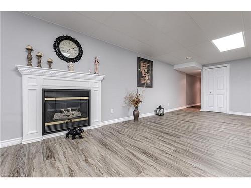 26 Blossom Avenue, Simcoe, ON - Indoor Photo Showing Living Room With Fireplace
