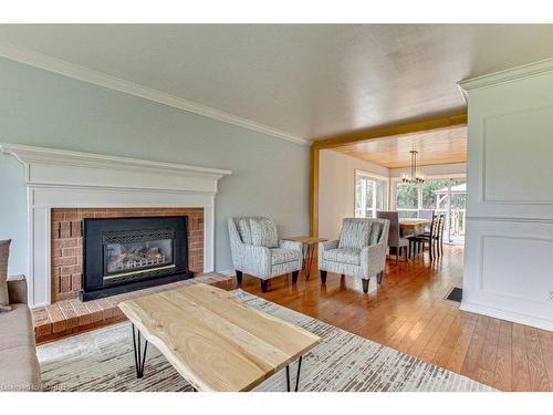 23 St Ladislaus Street, Courtland, ON - Indoor Photo Showing Living Room With Fireplace
