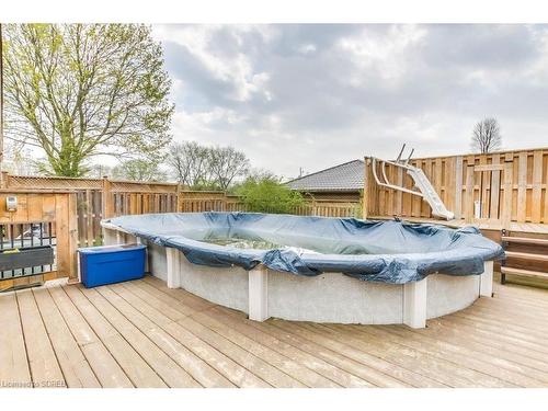 23 St Ladislaus Street, Courtland, ON - Outdoor With Above Ground Pool