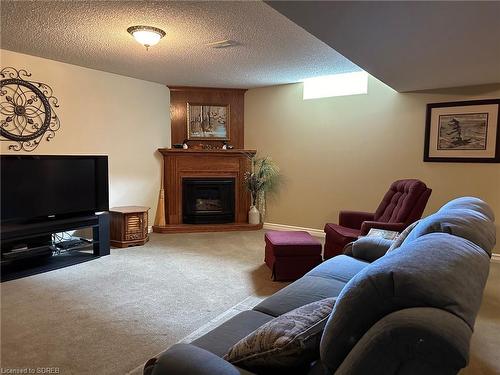 18 Coastal Court, Port Dover, ON - Indoor Photo Showing Living Room With Fireplace