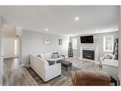883 Lynedoch Road, Simcoe, ON - Indoor Photo Showing Living Room With Fireplace