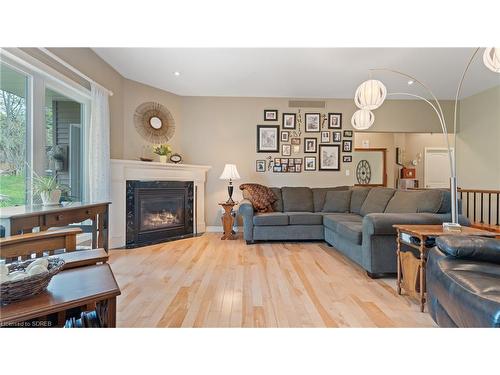 147 Wilson Drive, Simcoe, ON - Indoor Photo Showing Living Room With Fireplace