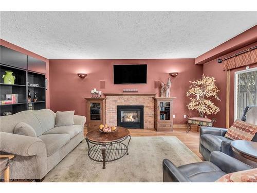 62 Lee Avenue, Simcoe, ON - Indoor Photo Showing Living Room With Fireplace