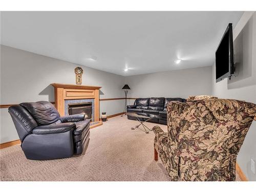 62 Lee Avenue, Simcoe, ON - Indoor Photo Showing Basement With Fireplace