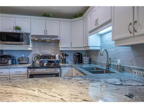 107-12 St Andrew Street, Port Dover, ON - Indoor Photo Showing Kitchen With Double Sink