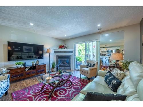 107-12 St Andrew Street, Port Dover, ON - Indoor Photo Showing Living Room With Fireplace