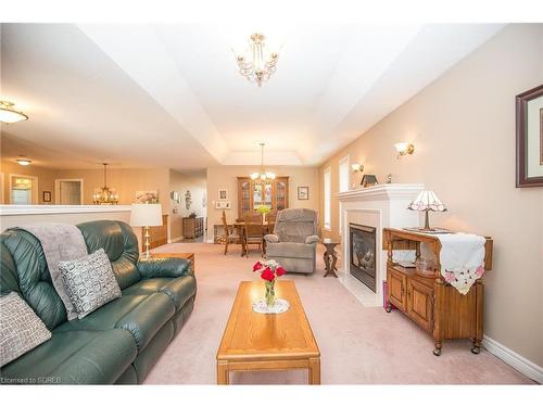 19 Coastal Court, Port Dover, ON - Indoor Photo Showing Living Room With Fireplace