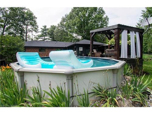 64 Rokeby Side Rd, Norfolk, ON - Outdoor With Above Ground Pool With Backyard