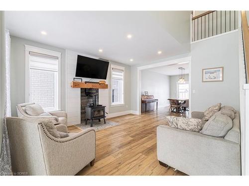 82 Sunview Drive, Norwich, ON - Indoor Photo Showing Living Room With Fireplace