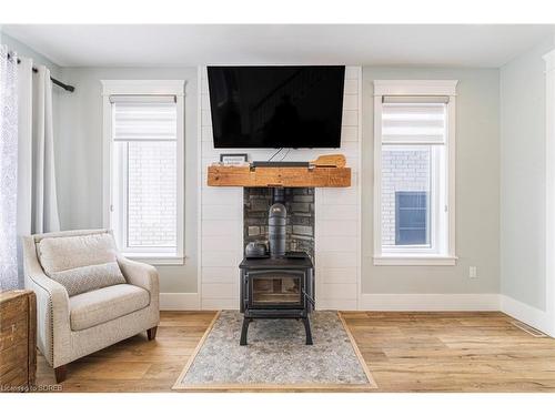 82 Sunview Drive, Norwich, ON - Indoor Photo Showing Living Room With Fireplace