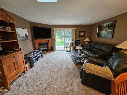 7-74 Wilson Avenue, Delhi, ON - Indoor Photo Showing Living Room With Fireplace