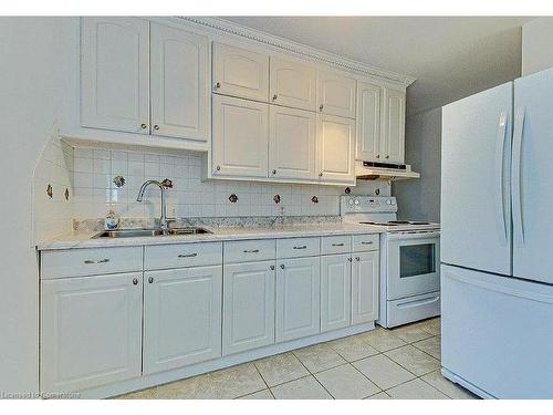 36 Parker Drive, Simcoe, ON - Indoor Photo Showing Kitchen With Double Sink