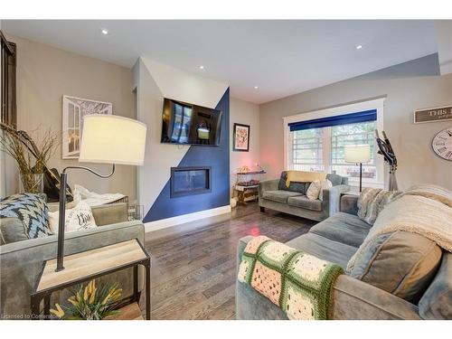 2016 Erie Street, Port Dover, ON - Indoor Photo Showing Living Room With Fireplace