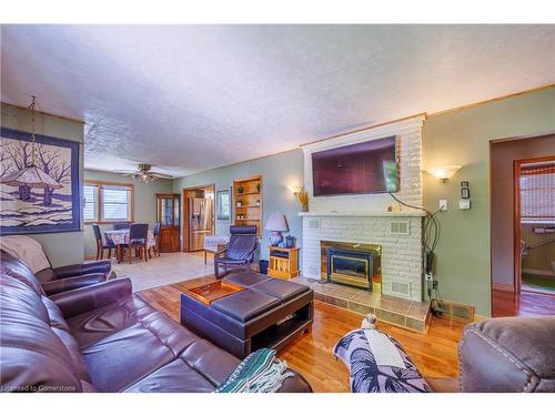 44 Parker Drive, Simcoe, ON - Indoor Photo Showing Living Room With Fireplace