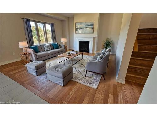 23 Tulip Crescent, Simcoe, ON - Indoor Photo Showing Living Room With Fireplace