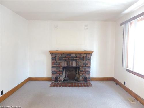 85 Colborne Street N, Simcoe, ON - Indoor Photo Showing Other Room With Fireplace