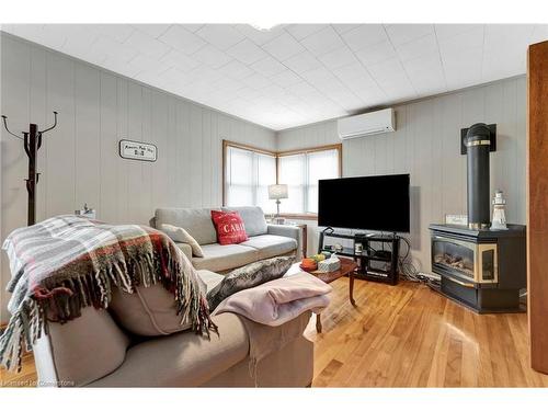 319 Erie Boulevard, Long Point, ON - Indoor Photo Showing Living Room With Fireplace