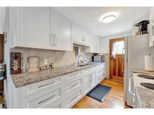 319 Erie Boulevard, Long Point, ON - Indoor Photo Showing Kitchen With Double Sink