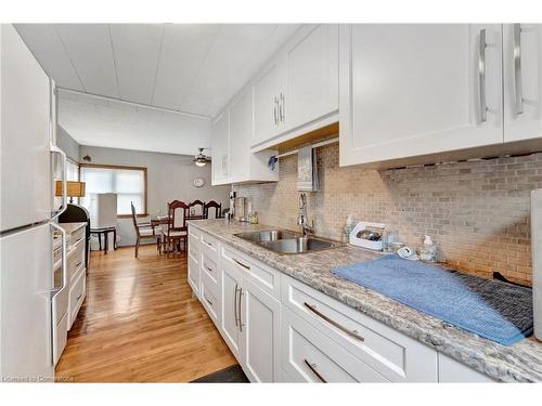 319 Erie Boulevard, Long Point, ON - Indoor Photo Showing Kitchen With Double Sink