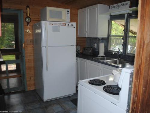 303 Erie Boulevard, Long Point, ON - Indoor Photo Showing Kitchen With Double Sink