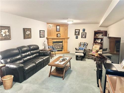 34-175 Victoria Court, Simcoe, ON - Indoor Photo Showing Living Room With Fireplace