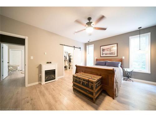 156 St. Johns Road West, Simcoe, ON - Indoor Photo Showing Bedroom With Fireplace