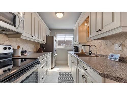 14 Montclair Crescent, Simcoe, ON - Indoor Photo Showing Kitchen With Double Sink