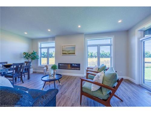 22 Pintail Lane, Port Rowan, ON - Indoor Photo Showing Living Room With Fireplace