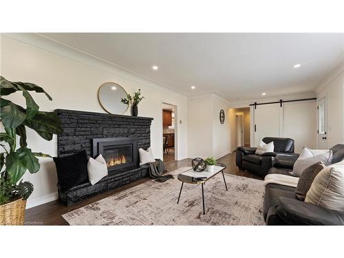 373 Decou Road, Simcoe, ON - Indoor Photo Showing Living Room With Fireplace