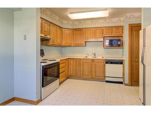 2-42 Donly Drive S, Simcoe, ON - Indoor Photo Showing Kitchen With Double Sink