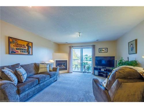 407-12 St. Andrew Street, Port Dover, ON - Indoor Photo Showing Living Room With Fireplace