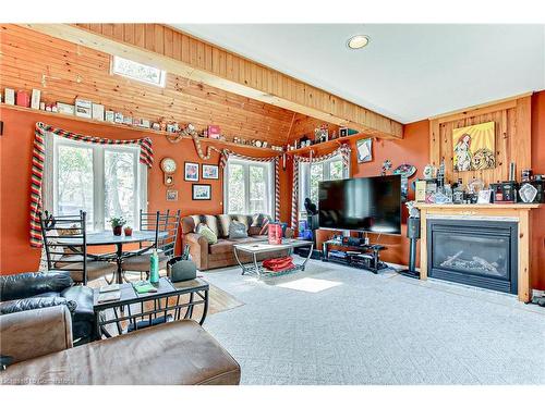 88 Woodstock Avenue, Long Point, ON - Indoor Photo Showing Living Room With Fireplace