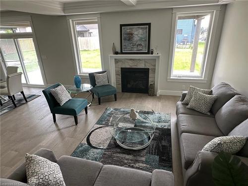 19 Mckeen Street, Jarvis, ON - Indoor Photo Showing Living Room With Fireplace