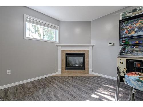 16 Gaal Court, Brantford, ON - Indoor Photo Showing Living Room With Fireplace