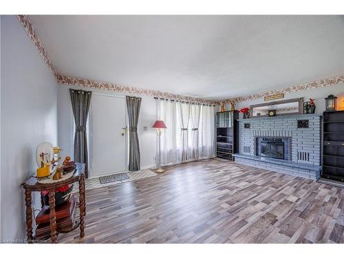 551 East Street, Delhi, ON - Indoor Photo Showing Living Room With Fireplace