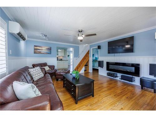 24 Private Lane, Long Point, ON - Indoor Photo Showing Living Room With Fireplace